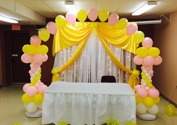 PINK AND YELLOW 100 BALLOON PILLAR